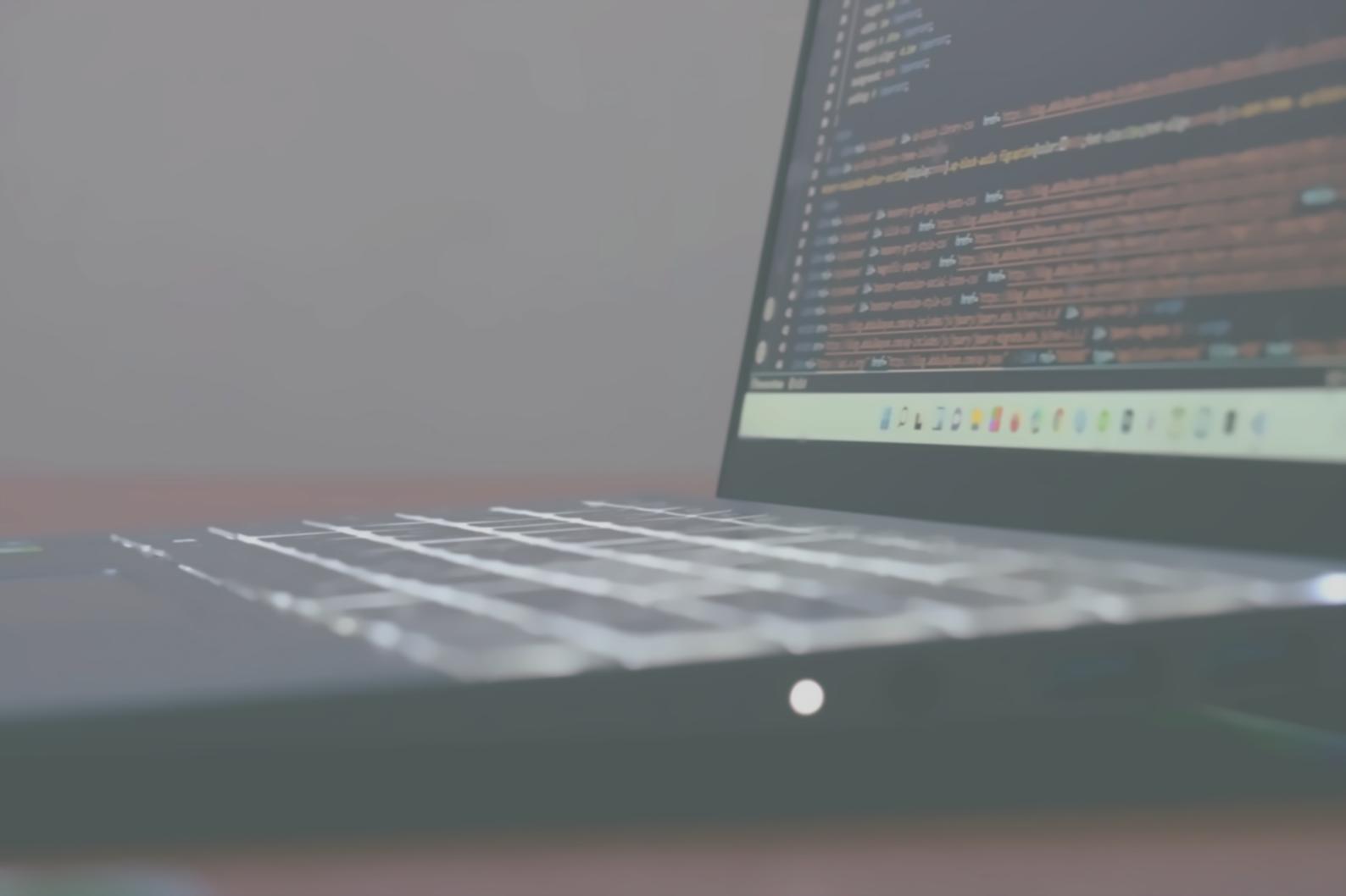 Designer analyzing interface patterns and user flow decisions on multiple screens